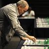 Former World Chess Champion Garry Kasparov plays a game of chess against eight-year old Ronan Ferreira on March 25, 2012in Pretoria, South Africa. 
