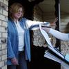 Canvasser for Coloradans for Fairness and Equality, Grace Burgwyn, 23-years-old, talks with Lakewood resident, Juanita Griggs, to urge voters to defeat the proposed marriage  amendment.