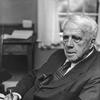 1958: American poet and 1924 Pulitzer Prize winner Robert Frost (1874 - 1963) sitting with a notebook and pen in hand. (Photo by American Stock/Getty Images)