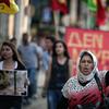 A Kurdish woman residing in Greece marches towards the Turkish embassy in Athens on July 21, 2015 to protest against the suicide bombing in the Turkish town of Suruc near the border with Syria.