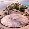 Picture taken by the US Defense Nuclear Agency in 1980, shows the huge dome, which has just been completed over top of a crater left by one of the 43 nuclear blasts on the Runit Island