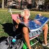 In Washington Square Park sunbathers enjoy in an unusually warm fall afternoon.