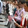 Immigrants from 27 countries recited the Oath of Allegiance as part of their naturalization process on Thursday. 