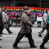 Irish groups march past anti-homophobia banners on Fifth Avenue at the St. Patrick's Day Parade on March 17, 2014.