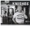 Mano Hirsch, of the eponymous knish shop on Brighton Beach. Sign in the upper left says, in Hebrew letters, Kosher.