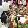 Kids making guacamole in a Coqui the Chef program in the South Bronx