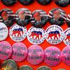 Donald Trump buttons for sale outside of his rally in Bethpage, Long Island, which attracted thousands of supporters and nearly 100 protesters. 