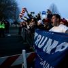 Supporters of Donald Trump rallied outside of his campaign event in Bethpage, Long Island. They faced off against more than 100 protesters on the other side of barriers.