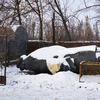 The statue of Lenin faces the ground outside a dog shelter in Sloviansk, a city under the control of Ukrainian forces not far from the frontline on January 5, 2016 in Sloviansk. 