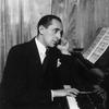 Pianist Vladimir Horowitz strikes a poignant pose at the piano, circa 1936.