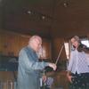 In this 1996 photo, Yehudi Menuhin teaches Clemency Burton-Hill the proper bowing technique.