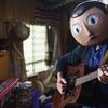 Michael Fassbender plays the papier-mâché mask-wearing Frank Sidebottom in the eccentric comedy 'Frank.'
