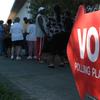 A sign points to voters lined up to cast their ballots at a polling place November 2, 2004 in St. Petersburg, Florida.