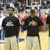 Members of the Georgetown University basketball team line up for the national anthem wearing 'I Can't Breathe' t-shirts to honor Eric Garner, who died while being placed in a police chokehold.
