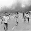 South Vietnamese forces follow after terrified children, including 9-year-old Kim Phuc, center, after an aerial napalm attack on suspected Viet Cong hiding places, June 8, 1972.