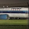 GOP vice presidential candidate Mike Pence's campaign airplane sits partially on the tarmac and the grass after sliding off the runway while landing at LGA Thu Oct 27, 2016