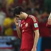 Javi Martinez (L) and Sergio Ramos of Spain look dejected in defeat after the 2014 FIFA World Cup match against Chile at Maracana on June 18, 2014 in Rio de Janeiro, Brazil. 
