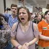 Students chant protest slogans outside the Florida House of Representatives chamber inside the Florida Capitol in Tallahassee, Fla., Feb 21, 2018. 