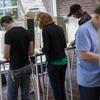 Voters fill out their ballots at the Cincinnati Public Library precinct on primary election day, Tuesday, May 8, 2018, in Cincinnati. 