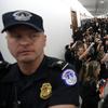 Capitol Hill Police move the crowd back as protesters speak out against Judge Brett Kavanaugh outside the office of Sen. Susan Collins, R-Maine, on Capitol Hill