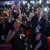 Supporters of Republican presidential candidate Donald Trump cheer as they watch election returns during an election night rally, Tuesday, Nov. 8, 2016, in New York.