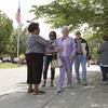 Voters walk through a gauntlet of campaign volunteers at the Durham County Library North Regional in Durham, N.C., Tuesday, May 8, 2018. 