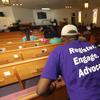 A man listens as Black Voters Matter co-founder LaTosha Brown speaks at a church as part of The South Rising Tour 2018 on Aug. 22, 2018, in Warner Robins, Ga. 