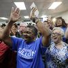 Supporters cheer as Florida Democratic gubernatorial candidate Andrew Gillum speaks at a Democratic Party rally Friday, Aug. 31, 2018, in Orlando, Fla.