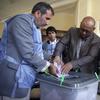 A man casts his vote during the second day of Parliamentary elections in Kabul, Afghanistan, Sunday, Oct. 21, 2018. 