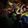 Supporters of Jair Bolsonaro celebrate in front of his residence in Rio de Janeiro, Brazil, Sunday, Oct. 28, 2018. 
