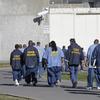  In this photo Feb. 26, 2013 file photo, inmates walk through the exercise yard at California State Prison Sacramento, near Folsom, Calif. 