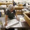 Workers at the Maricopa County Recorder's Office go through ballots Thursday, Nov. 8, 2018, in Phoenix. 
