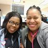 This Monday, Nov. 19, 2018, selfie provided by Nichelle Payne-Bush shows Payne-Bush, right, with Dr. Tamara O'Neal at Mercy Hospital in Chicago. 