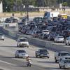 Traffic on Interstate 405 is seen from the Sherman Oaks Galleria mall parking lot Wednesday, July 13, 2011, in Los Angeles.