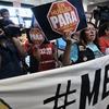 McDonald's workers protest inside of a McDonalds restaurant in south Los Angeles on Tuesday, Sept. 18, 2018