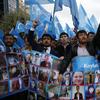 People from the Uighur community living in Turkey carrying flags of what ethnic Uighurs call 'East Turkestan', chant slogans during a protest in Istanbul, Tuesday, Nov. 6, 2018