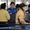 TSA workers work at O'Hare International Airport on Christmas day in Chicago, Tuesday, Dec. 25, 2018.