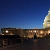 the U.S. capitol building lit up at dusk