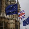 European flags and a British Union flag placed by anti-Brexit remain in the European Union supporters are blown by the wind across the street from the Houses of Parliament