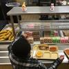  In this Jan. 25, 2017, file photo, students fill their lunch trays at J.F.K Elementary School in Kingston, N.Y., where all meals are now free under the federal Community Eligibility Provision. 