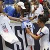 United States forward Carli Lloyd signs autographs for fans after an international friendly soccer match against Mexico, Sunday, May 26, 2019, in Harrison, N.J. The U.S. won 3-0. 