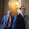 Treasury Secretary Steven Mnuchin leaves a meeting with top congressional leaders, including Speaker of the House Nancy Pelosi, D-Calif.