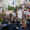 Police block protesters from advancing to La Fortaleza governor's residence in San Juan, Puerto Rico, Sunday, July 14, 2019.