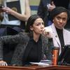 Alexandria Ocasio-Cortez, Ayanna Pressley, and Rashida Tlaib listen during a House Oversight and Reform Committee meeting.