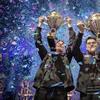 In this Saturday, July 27, 2019 photo, provided by Epic Games, Emil 'Nyhrox' Bergquist Pedersen, of Norway, left, and David 'Aqua' Wang, hold up their trophies after winning the Fortnite World Cup.
