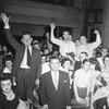 Some of the 28 men acquitted in the lynching of Willie Earle, a black man, celebrate in the court room at Greenville, S.C., following the jury's verdict, May 21, 1947. 