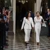 Rep. Alexandria Ocasio-Cortez, D-N.Y., right arrives with her guest, Ana Maria Archila of New York, N.Y., to hear President Donald Trump deliver his State of the Union address.