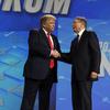 President Donald Trump shakes hands with NRA executive vice president and CEO Wayne LaPierre, has he arrives to speak to the annual meeting of the National Rifle Association, Friday, April 26, 2019.
