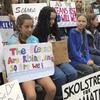 Swedish environmental activist Greta Thunberg, center, participates in a demonstration in front of the United Nations, Friday, Sept. 6, 2019 in New York.