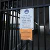 Signs are posted on the doors of Garfield Elementary School informing that the school is closed due to Pacific Gas & Electric possibly shutting off power on Wednesday, Oct. 9, 2019, in San Leandro.